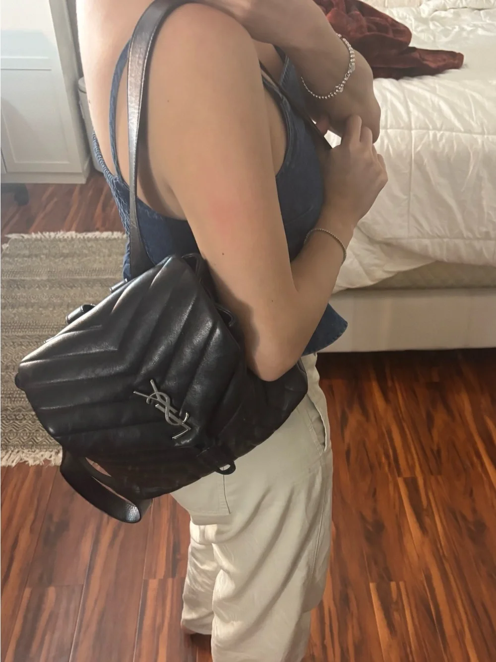 Saint Laurent Black Quilted Leather Backpack with Silver YSL Emblem